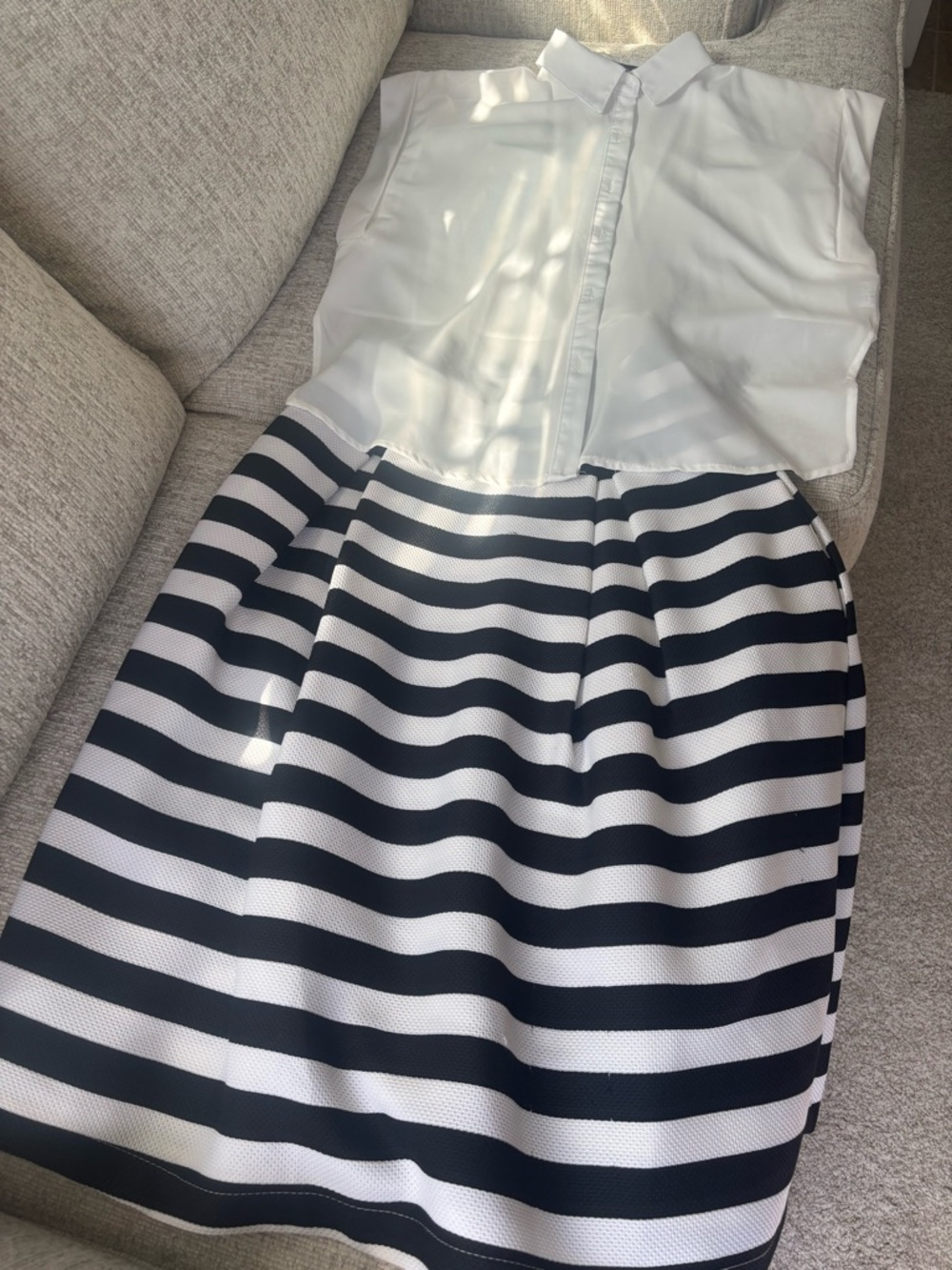 White Blouse can be tied in the front or left loose cropped tie back